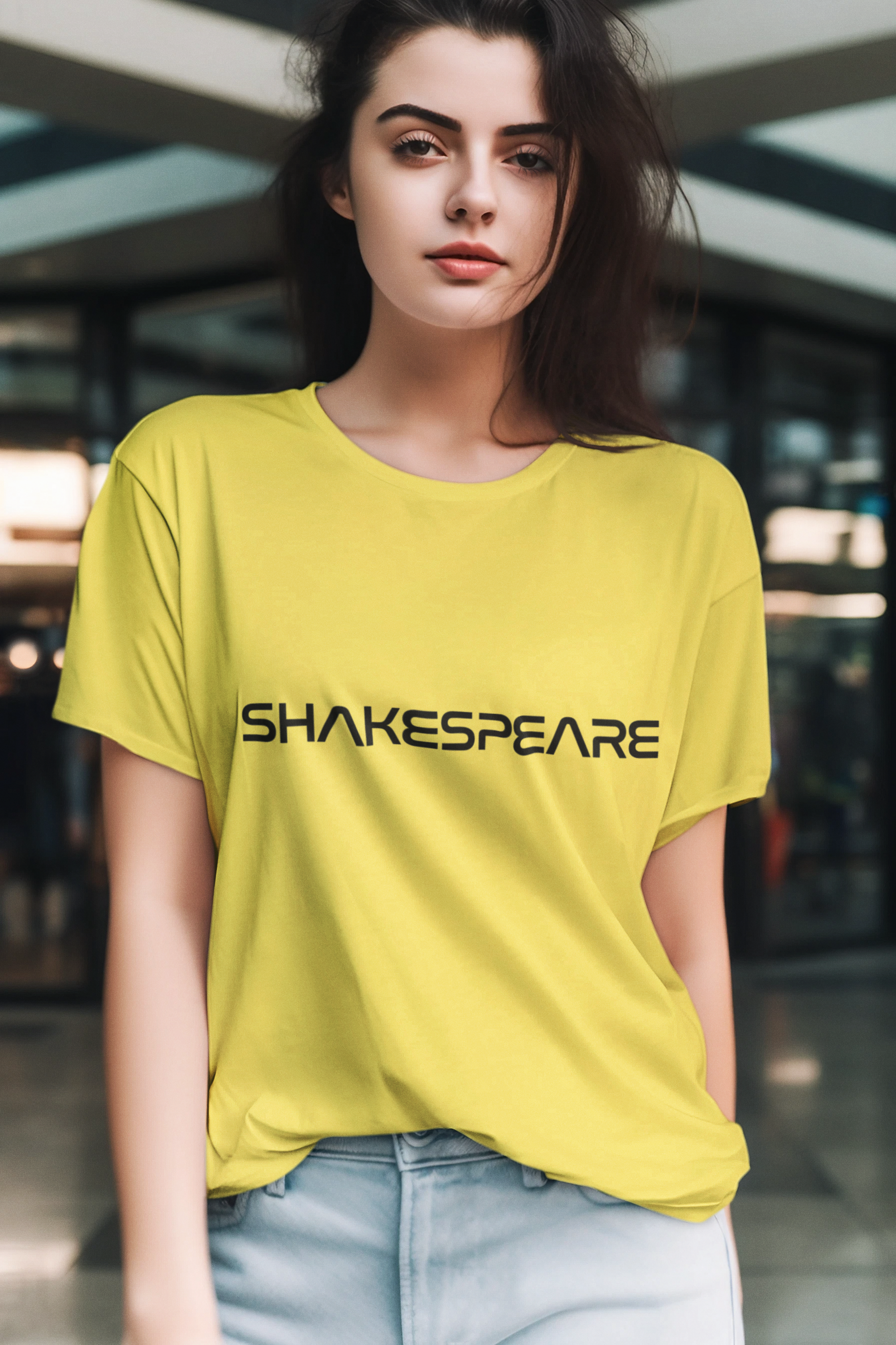 Woman in yellow Shakespeare in Space t-shirt